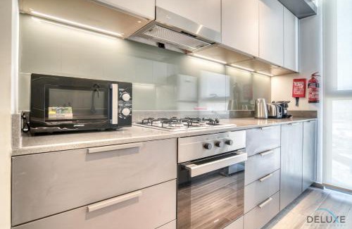 Dubai Production City Apartment | Suave 2BR with Assistant Room at Mesk 1 Midtown Dubai Production City by Deluxe Holiday Homes