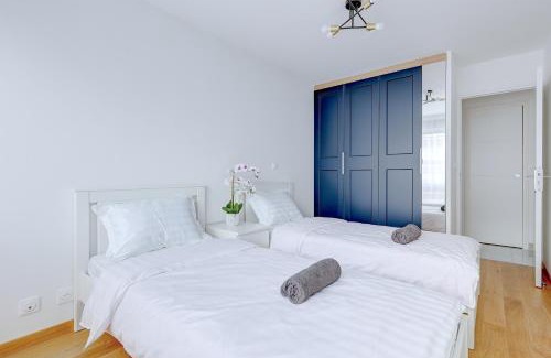 Flandres Apartment | Suite au Cœur de Paris, Architecturale et Élégante