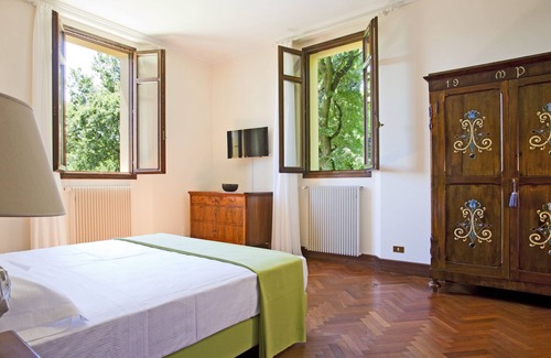 Crespellano Apartment | Suite in Historic Villa immersed in a beautiful green park with a swimming pool.