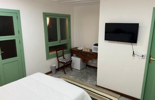 Areal House | Suite IPÊ ROSA