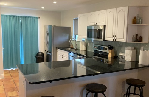 New Smyrna Beach House | Summer by the Sea 250 steps to toes in sand