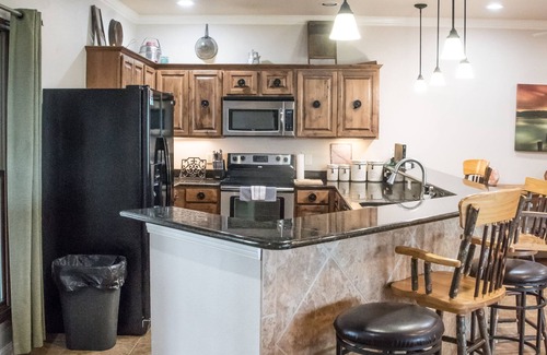 Gruene Condo | Summer Price Drops! Ask about free night! on the Guadalupe River in Gruene!