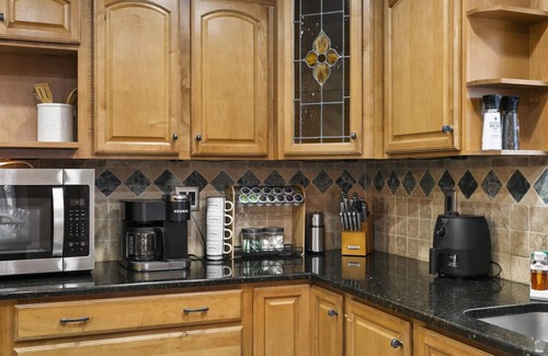 Pinellas Park House | Sun Coast Paradise: Fenced Terrace w/Pool, Spa. Gourmet Kitchen/Game Room Pets OK