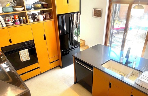 Pointe-Saint-Charles House | Sun-filled designer home with private garden and garage near Old Montreal