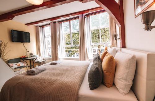 Burgwallen Nieuwe Zijde Bed & Breakfast | Sunflower Amsterdam