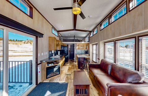 Colorado Springs Cottage | Sunlit cabin on 1,800-acre ranch with animals, mountains, games & firepit