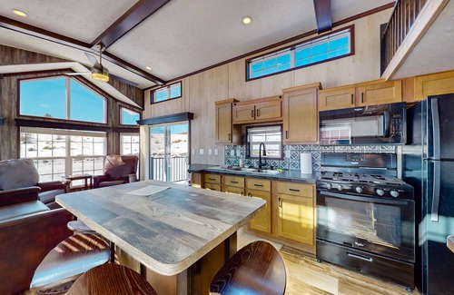Colorado Springs Cottage | Sunlit cabin on 1,800-acre ranch with animals, mountains, games & firepit