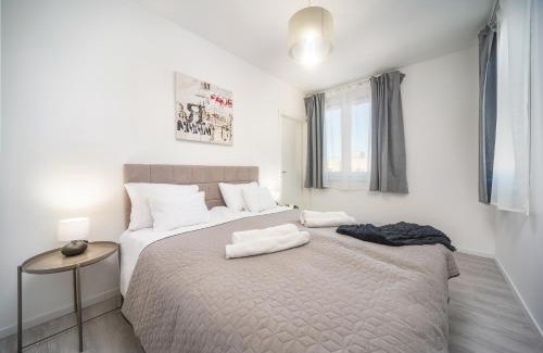 Corvin negyed Apartment | Sunlit Heaven 2-BDR Apartments