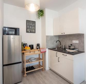 Corvin negyed Apartment | Sunlit Heaven 2-BDR Apartments