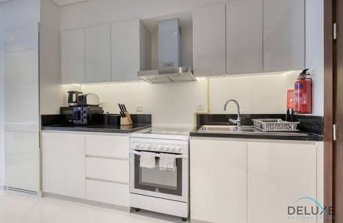 Dubai Apartment | Sunlit Studio At Golf Promenade 2A DAMAC Hills by Deluxe Holiday Homes