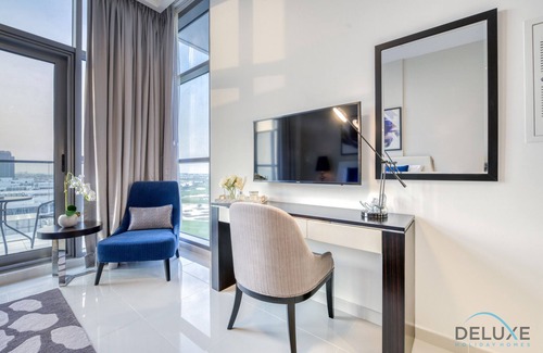 Dubai Apartment | Sunlit Studio At Golf Promenade 2A DAMAC Hills by Deluxe Holiday Homes