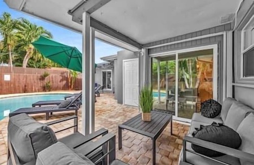 Middle River Terrace House | Sunny Days Getaway, 5BD Heated Pool Family Home!