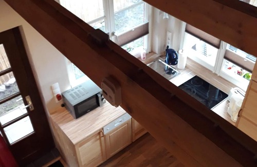Barth House | Sunny holiday home with a cozy sleeping loft, idyllically located in the garden.