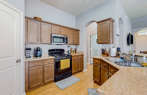 College Station House | Sunny stay between Houston and Austin with pond views, deck, & modern interior