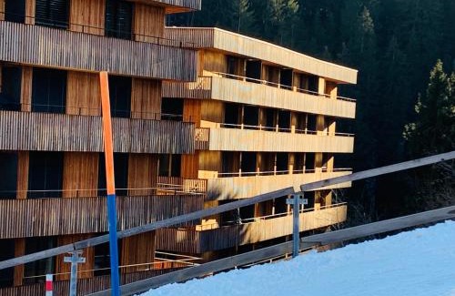 Flims Apartment | Sunny Stenna Selva 3-room ski-in ski-out apartment right by the slopes & lifts