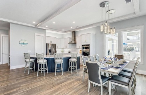 Navarre Beach House | Sunset Island Villa: Gorgeous large 5 bedroom beach home located directly on the sound! Sleeps 10