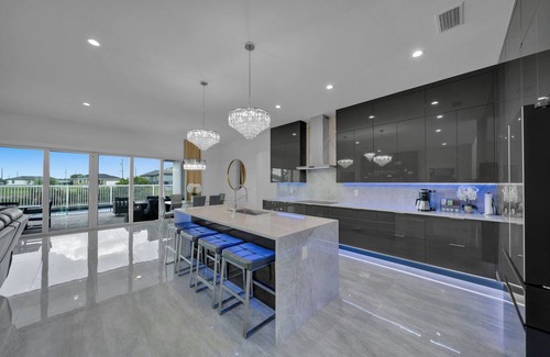 Burnt Store House | Sunset Manor - Luxurious 5BR/4BA Pool Canal front home in Cape Coral