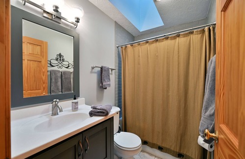 Northwoods Beach House | Sunset Pines- beautiful home with Northwesterly views of Grindstone Lake!