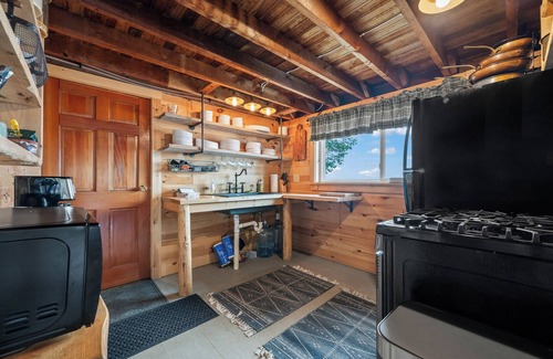 Rangeley Plantation Cabin | Sunset Point Camps - Spectacular Mooselookmeguntic cabins, offering privacy & 2 beaches!