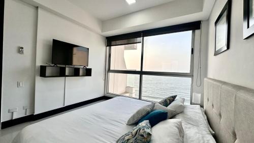 Soacha Apartment | Sunset Serenity 2 BR Front Beach
