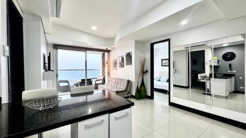 Soacha Apartment | Sunset Serenity 2 BR Front Beach