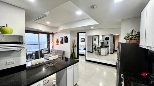 Soacha Apartment | Sunset Serenity 2 BR Front Beach