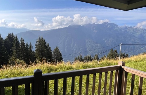Villard-sur-Doron Apartment | Superb, cozy mountain apartment with shared pool.
