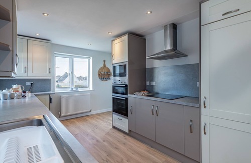 Rhosneigr House | Superb family getaway, sleeps 8, pet friendly, south facing garden near beaches