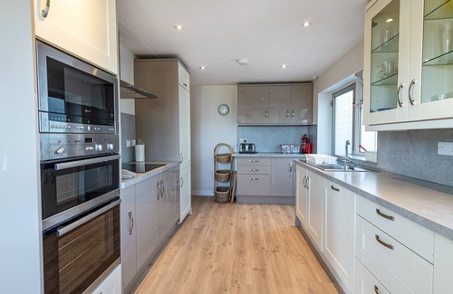 Rhosneigr House | Superb family getaway, sleeps 8, pet friendly, south facing garden near beaches
