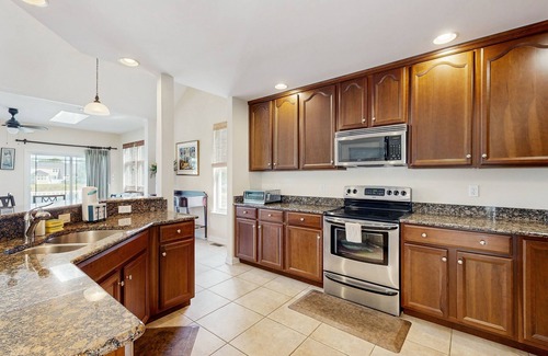 Swann Cove House | Swann Cove spacious house w/community pool, deck, patio & grill