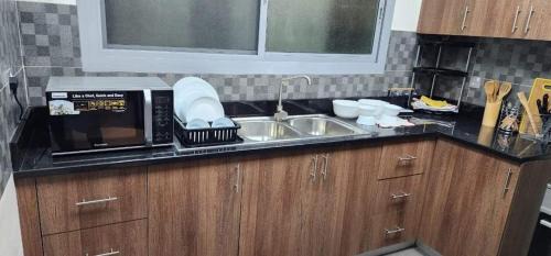 Al Muraqqabat Apartment | Sweet 703-Room-1
