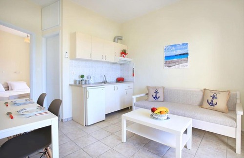 Gouves Apartment | Swim, sunbathe, relax in beach front apt Theodosia