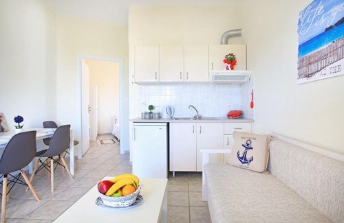 Gouves Apartment | Swim, sunbathe, relax in beach front apt Theodosia