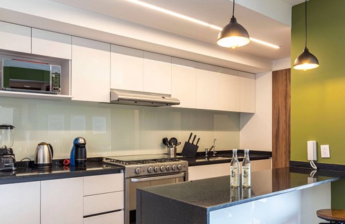 Hipodromo Condesa Apartment | Taman by Kukun Summar