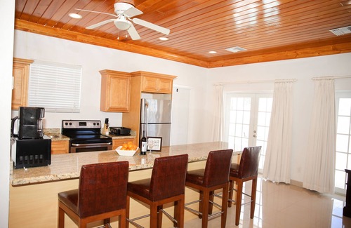 Nassau Apartment | Tangerine Sunsets Satsuma One