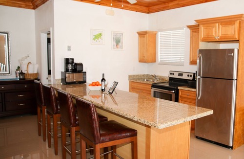Nassau Apartment | Tangerine Sunsets Satsuma One