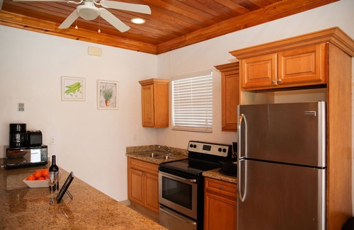 Nassau Apartment | Tangerine Sunsets Satsuma One
