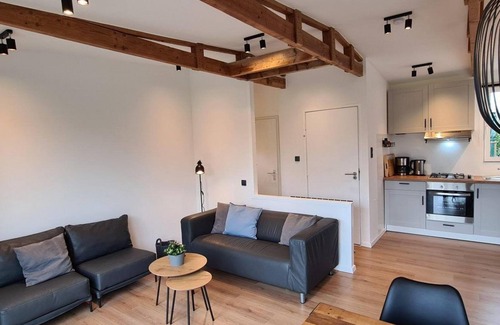 Sint Maartensvlotbrug House | Tastefully furnished, completely renovated 4-person bungalow on the popular park Eureka, near beach, sea, dunes and forest. Free WiFi, pet welcome. Ideal for families.