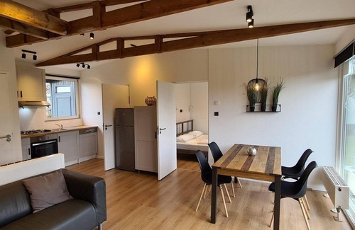 Sint Maartensvlotbrug House | Tastefully furnished, completely renovated 4-person bungalow on the popular park Eureka, near beach, sea, dunes and forest. Free WiFi, pet welcome. Ideal for families.
