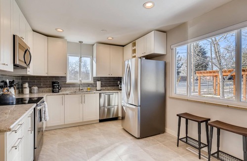 East Colorado Springs House | Tastefully Updated Central Springs Escape with Hot Tub, Pergola, and Fire Pit
