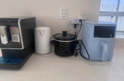 Royal Poinciana Apartment | Tempurpedic Queen - Laundry, Parking & EV Charger