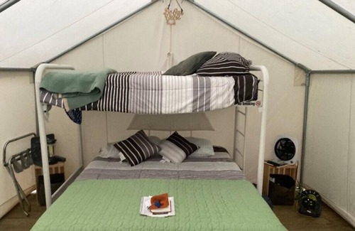 Grawn RV Rental | Tentrr Signature Site - Pine Meadows - Coleman Cooking Site