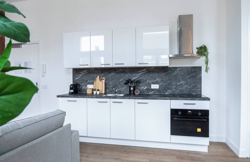 Municipality of Tilburg Apartment | The apartment features a luxuriously furnished bedroom. New Studio Apartment with Shared garden.
