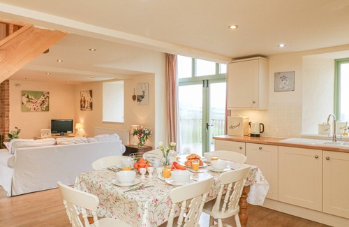 Axminster Cottage | THE APPLE BARN AT WYKE FARM, pet friendly in Lyme Regis