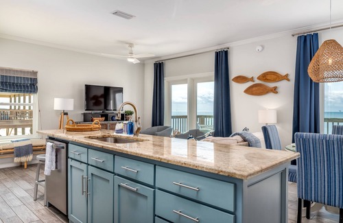 Dauphin Island House | The beach is your backyard in this gulf-front cottage!