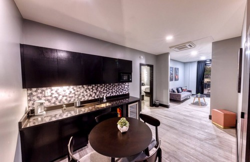 Biloxi Hotel | The Bella Downtown's Young Money Manor Suite, 2 Queen Beds, Sleeps 4