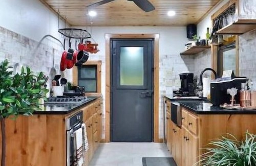 Baird House | The Belle Plain Caboose is a private romatic stay with great fishing!