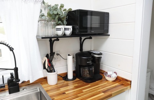 Mingoville Cabin | The Bellefonte Campground presents: The Luxury Hideaway Container Home, hot tub, Rooftop veranda, and more.