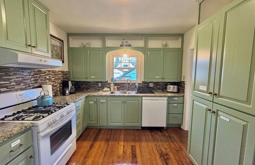 Garden District House | The Blue Gable Downtown CDA. Hot Tub, Home Theater, Game Room, 2 King Beds!