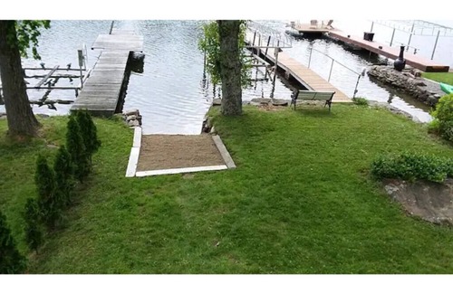 Winchester Cottage | The Cottage at Highland Lake, year-round, waterfront with a boat dock